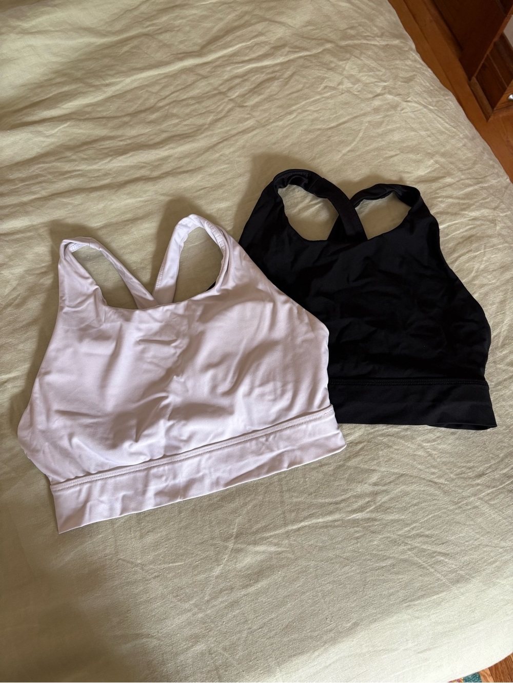 Fabletics Racerback Sports Bras in Black and White (Set of 2) removable pads